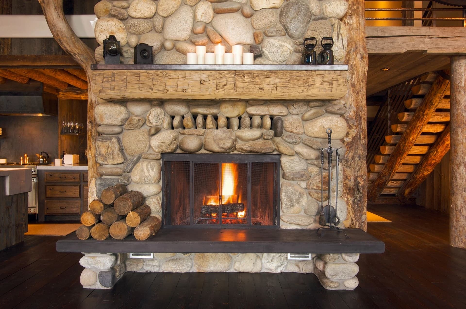Rustic fireplace with stone pattern.